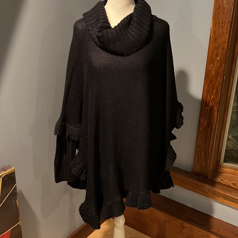 Very dark navy poncho style sweater with sleeves